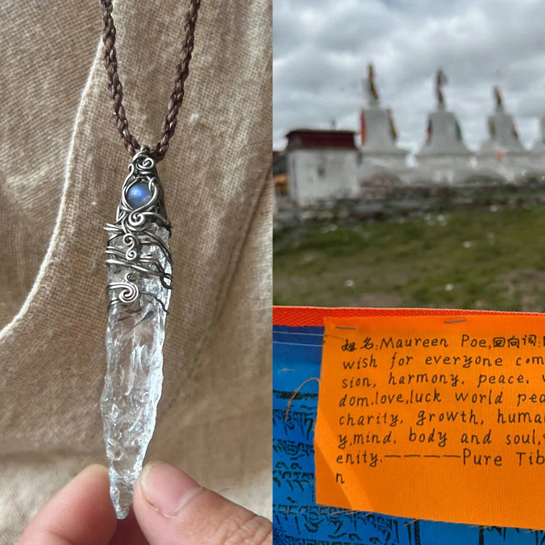 Pendant worn on a cord; right side shows distant stupas and a handwritten note on bright fabric.